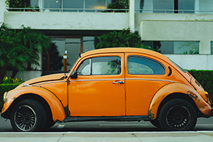 Old orange Volkswagen Beetle car